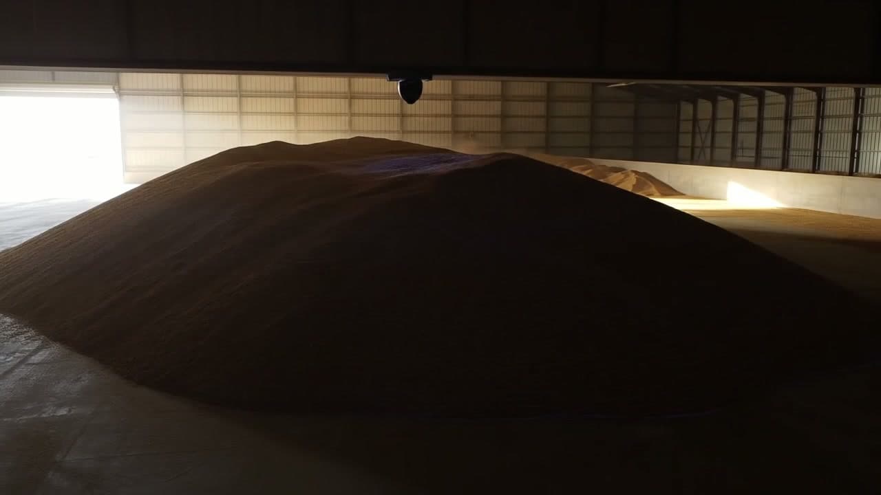 Drone scanning feed stockpile inventory